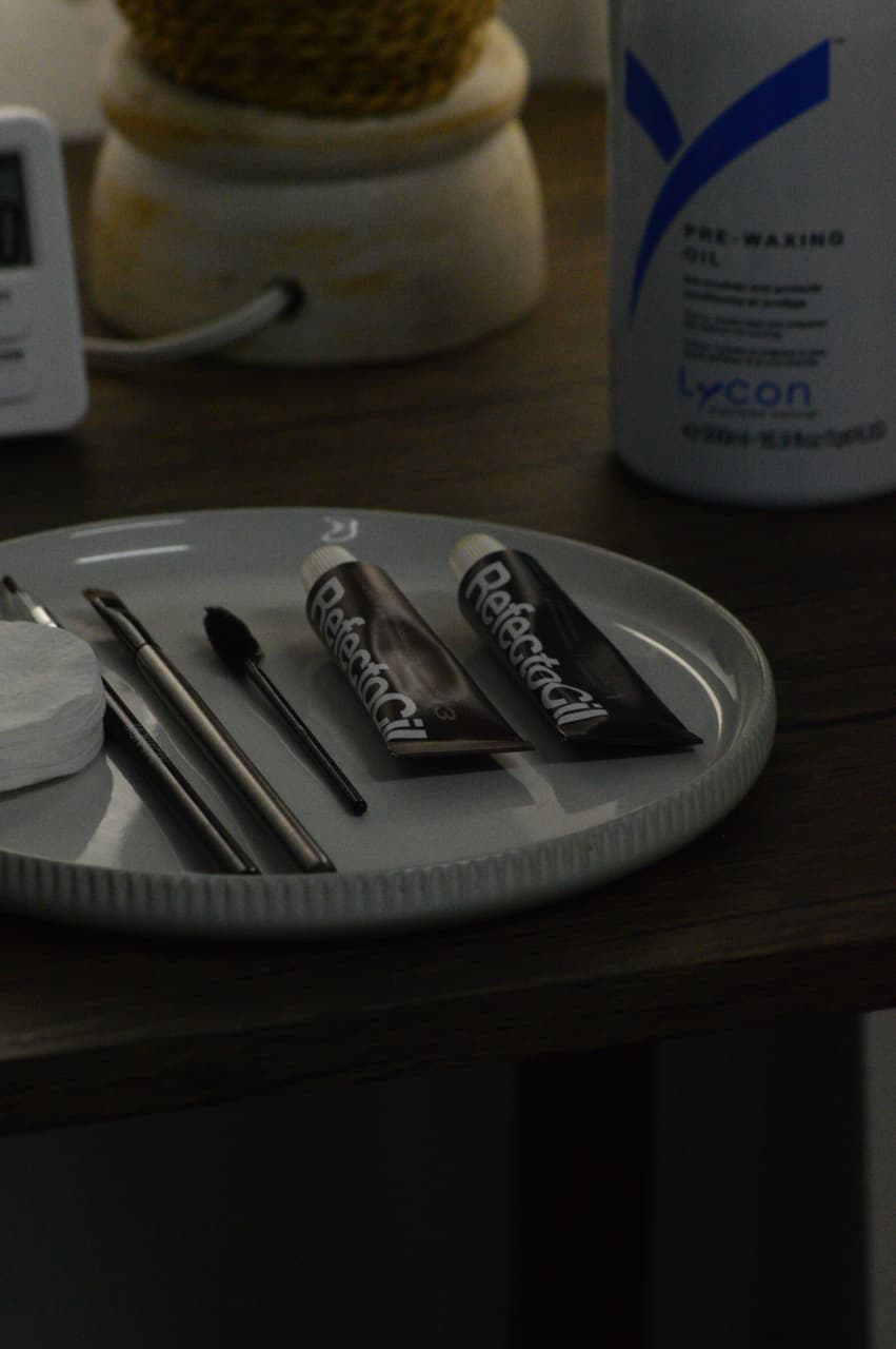 Brow treatment products prepared neatly on a tray