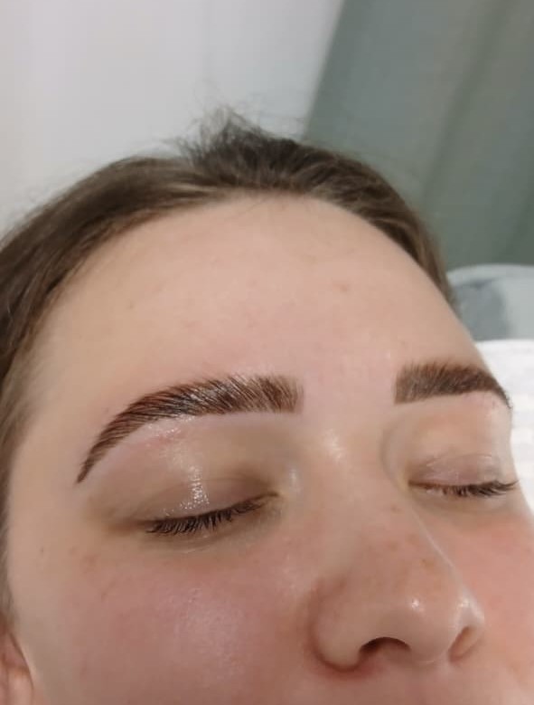 Freshly shaped and tinted brows after treatment